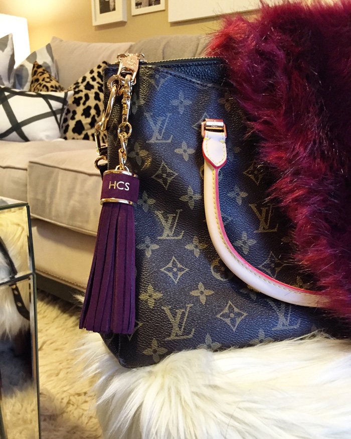 ALL TASSEL, NO HASSLE: BAG CHARMS.